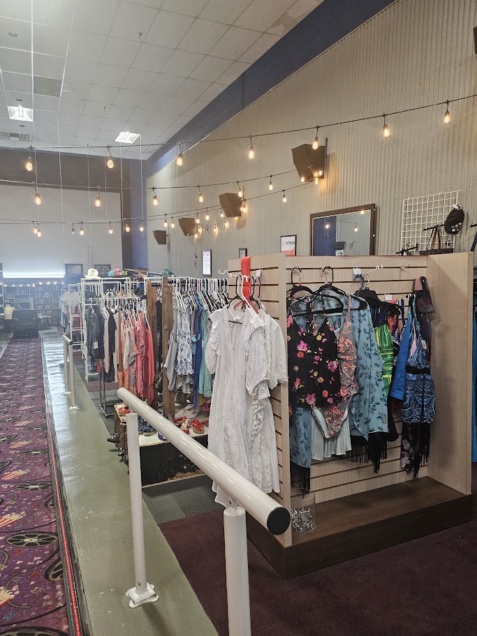 Clothing racks inside Alpha & Omega Outfitters